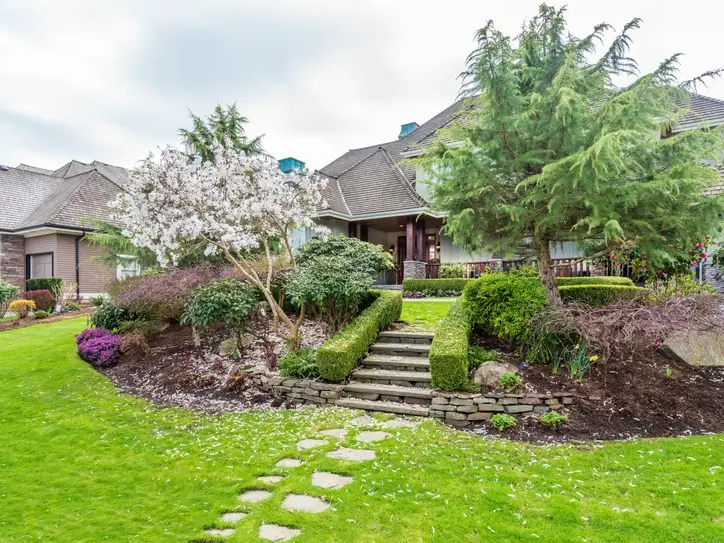 custom patio and walkway installation near Cedar River in Renton WA with slope-aware site plan